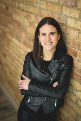 Confident performer portrait with natural background