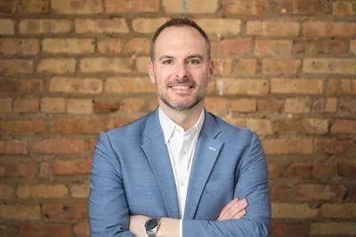 Male actor headshot with natural indoor light